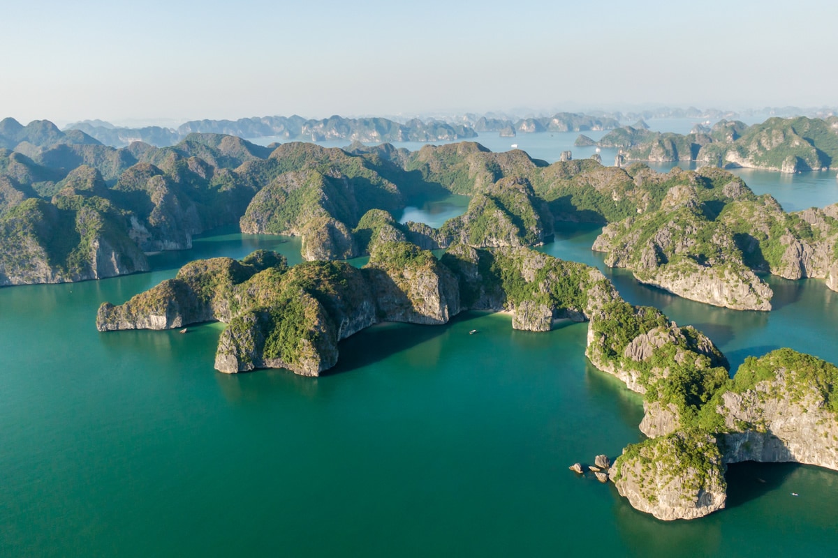 Lan Ha Bay Three Peaches Island pristine limestone karsts and emerald water