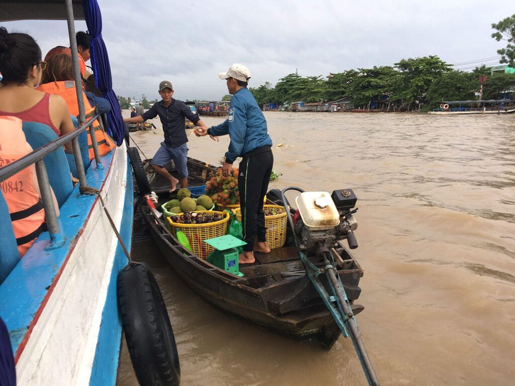 Mekong Delta Flavours and River Private Day Tour from Saigon onboard