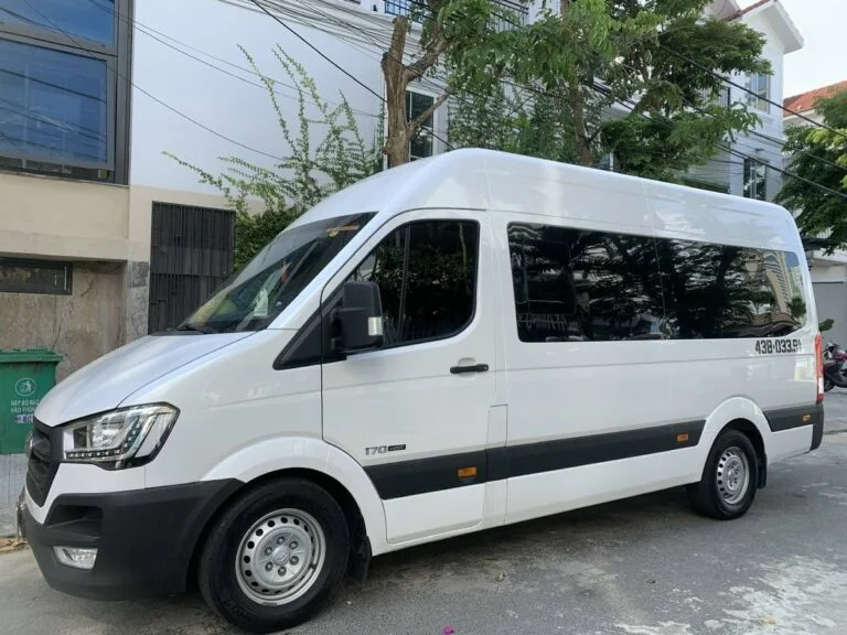16-seat minivan with driver in Vietnam: Hyundai Solati, Ford Transit or similar