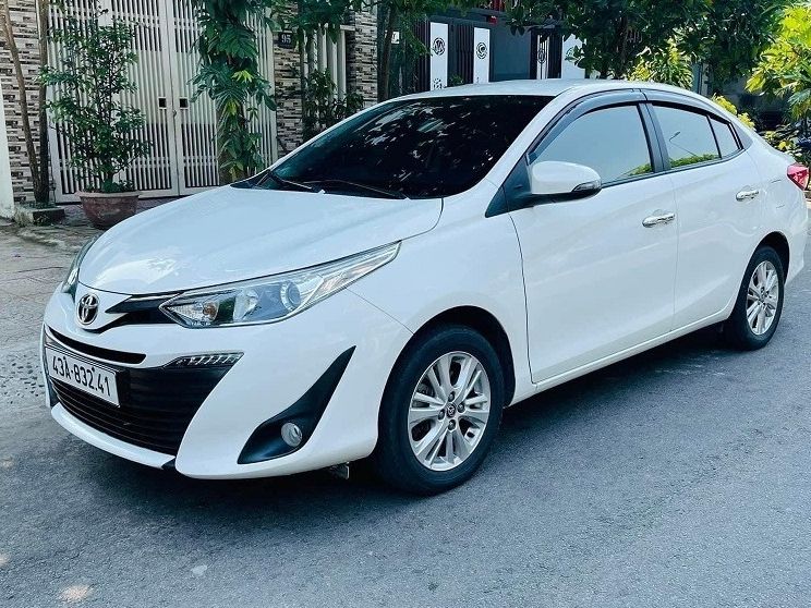Sedan with driver in Vietnam: Toyota Vios or similar